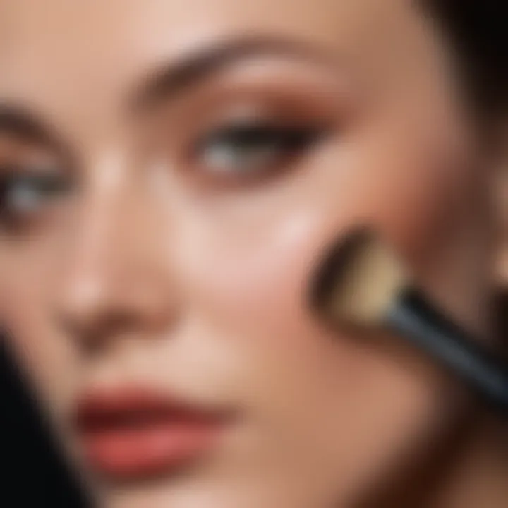 Close-up of a contour brush applying product to cheekbone