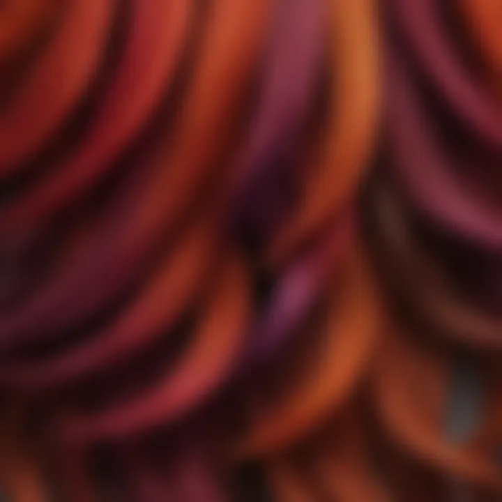 A close-up of hair strands dyed in vibrant hues, highlighting color application techniques